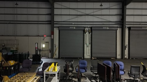 Clean overhead structure above the loading dock doors